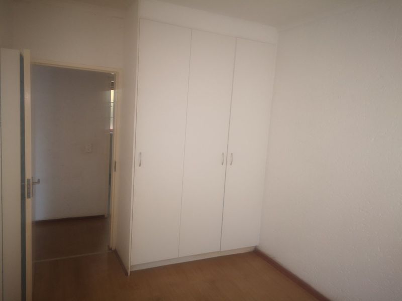 Serene 1-Bedroom Upstairs Unit in Secure Complex - Photo 2