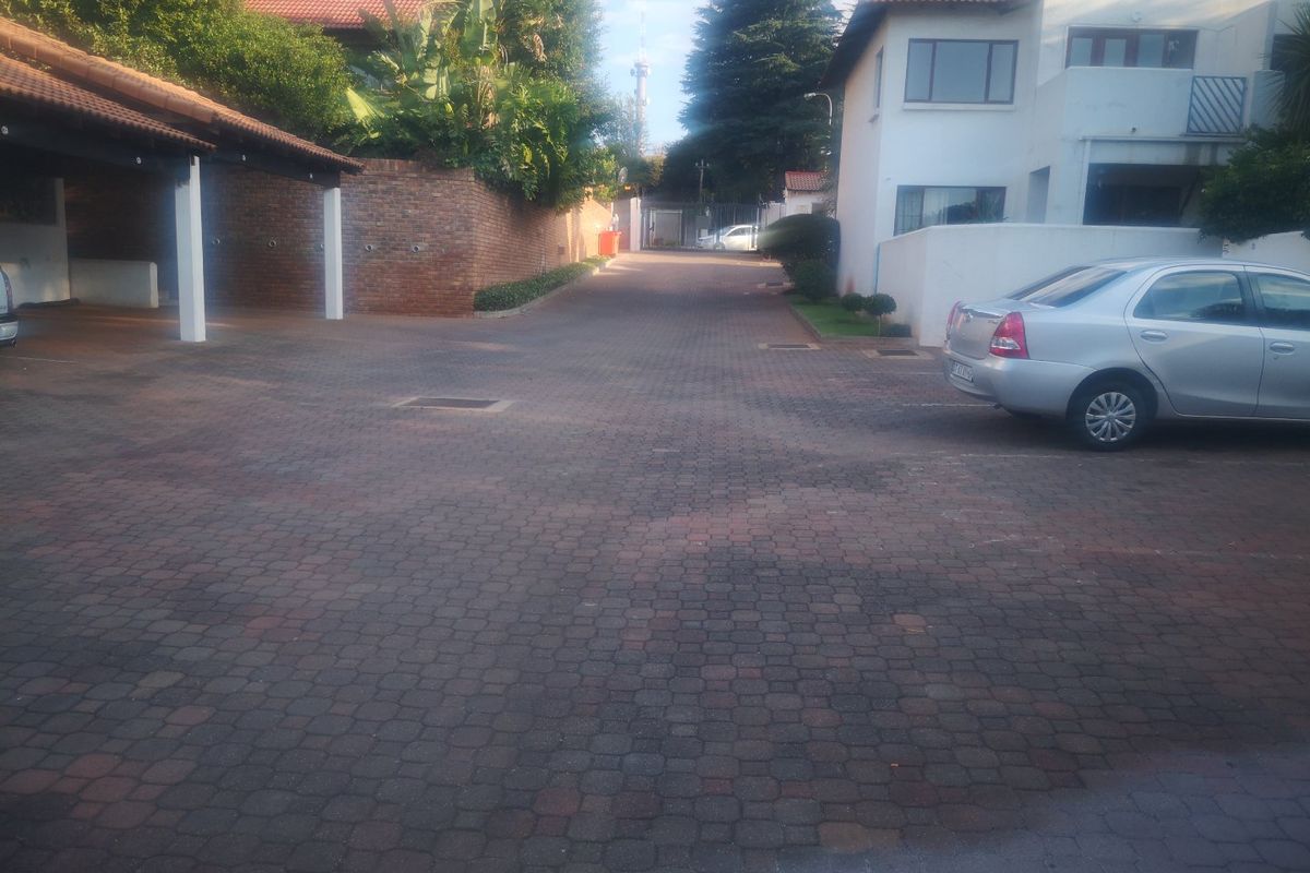 Serene 1-Bedroom Upstairs Unit in Secure Complex - Photo 5