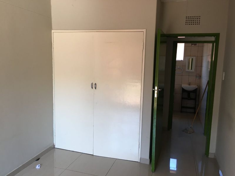 Secure 1-Bed Garden Unit with Family-Friendly Features - Photo 10