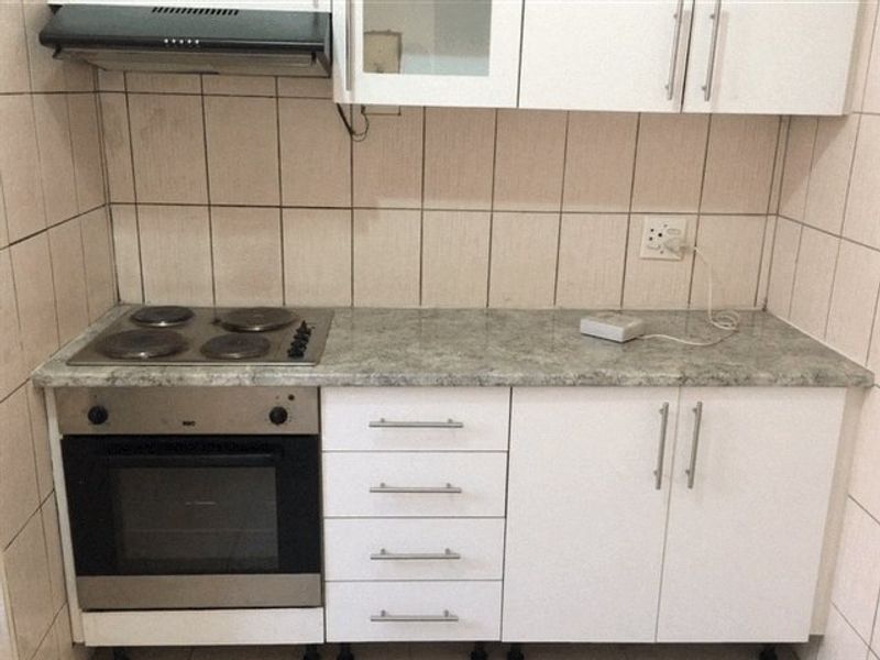 Secure 1-Bed Garden Unit with Family-Friendly Features - Photo 6