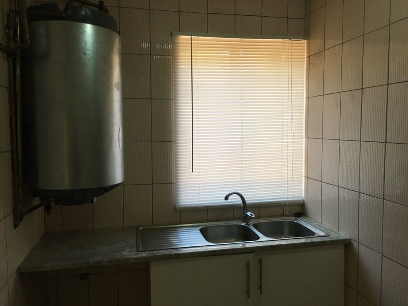 Secure 1-Bed Garden Unit with Family-Friendly Features - Photo 9