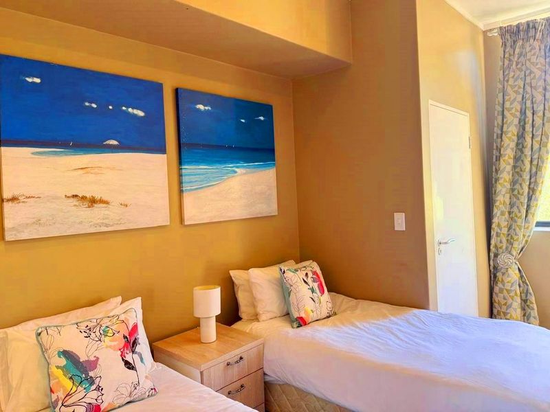 Elevated Living: Secure Top-Floor Apartment with Nature Reserve Views & Direct Mall Access - Photo 9