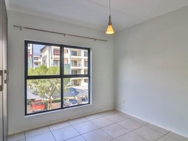 Modern 3-Bed Home with Pool and 24-Hour Security - Photo 10