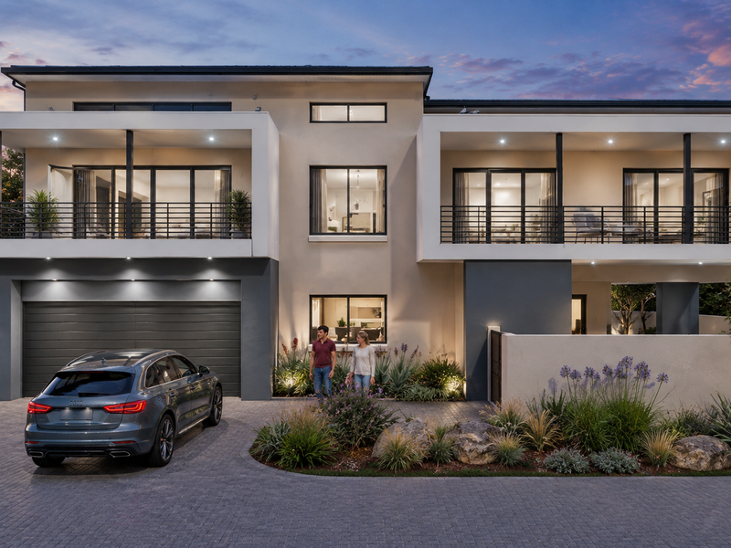 Modern double-story residence featuring a paved driveway, double garage, and expansive upper-level balconies with contemporary architectural finishes and landscaped garden surrounds.