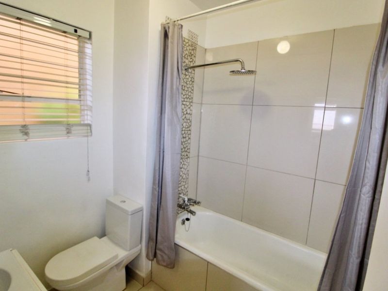 Stylish 1-Bedroom Flat with Modern Finishes - Photo 6