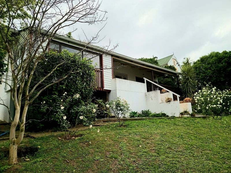 Versatile Knysna Central Investment Opportunity with Lagoon Views and Income Generating Flatlet - Photo 2