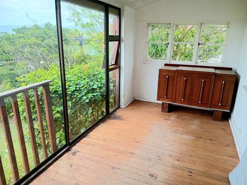 Versatile Knysna Central Investment Opportunity with Lagoon Views and Income Generating Flatlet - Photo 8