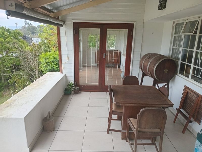 Versatile Knysna Central Investment Opportunity with Lagoon Views and Income Generating Flatlet - Photo 7