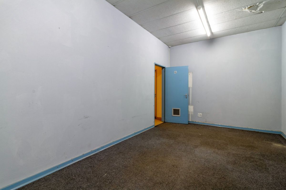 Low-Maintenance Investment Property with Central Cooling & Generator Backup! - Photo 2