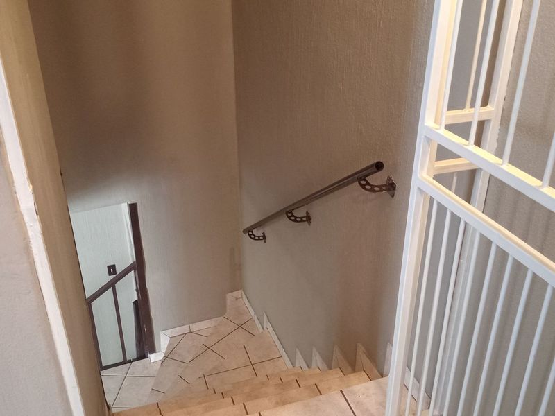 Cozy 2-Bedroom Duplex with Garden and Braai Area - Photo 10