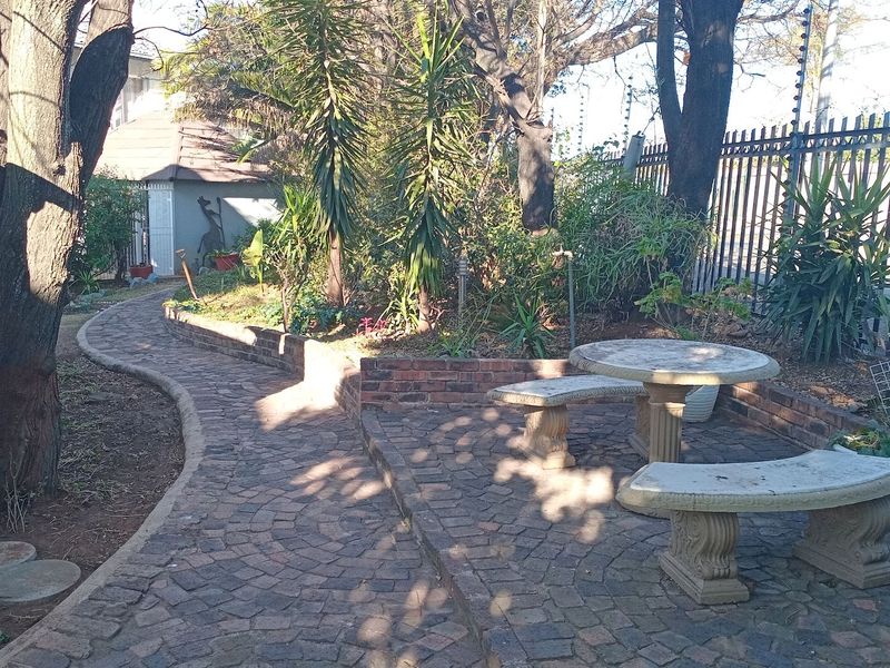 Cozy 2-Bedroom Duplex with Garden and Braai Area - Photo 7