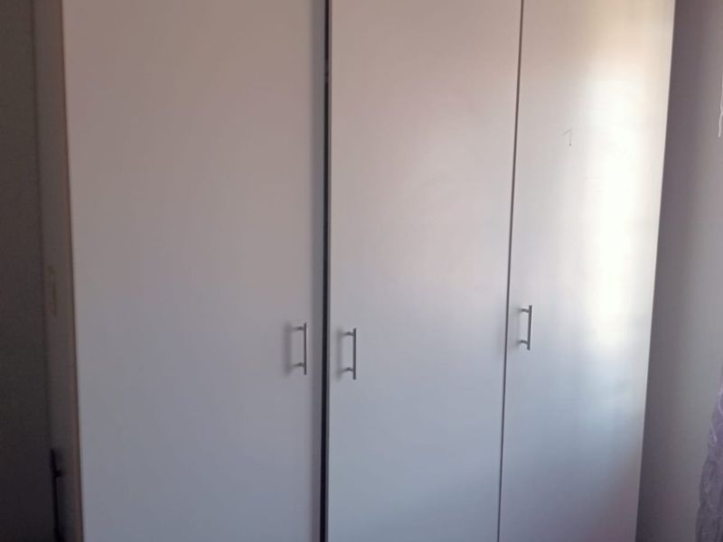 Spacious 3-Bedroom Home with Entertainment Area on Large Stand - Photo 7