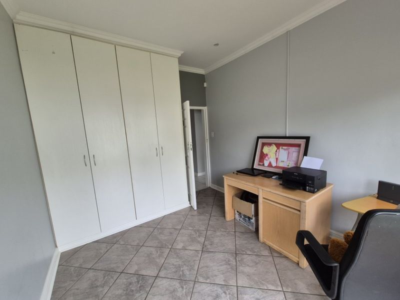 Versatile 4-Bedroom Family Home with Cottage Potential, Pool, and Top Security - Photo 9