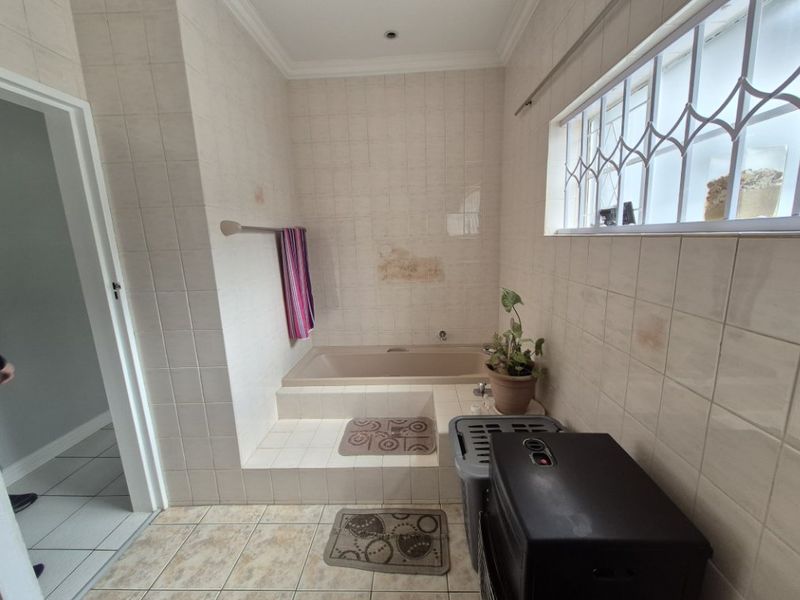 Versatile 4-Bedroom Family Home with Cottage Potential, Pool, and Top Security - Photo 6