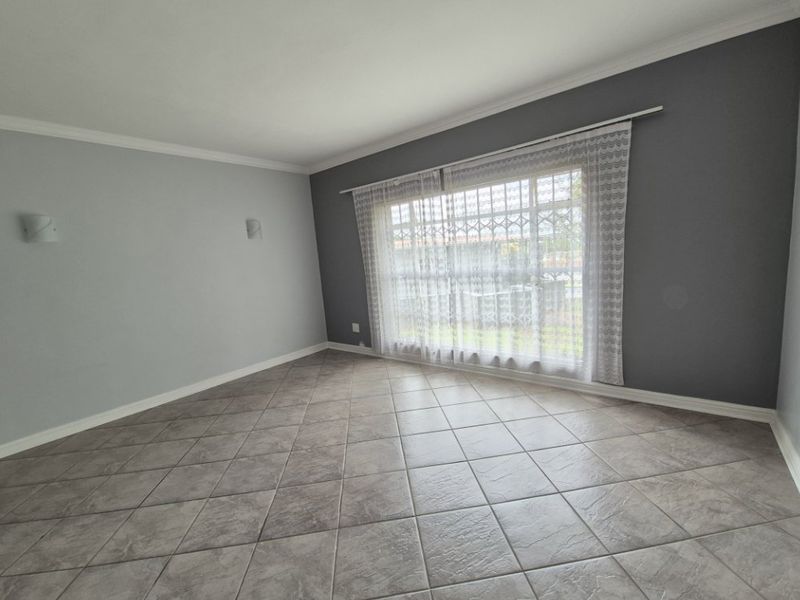 Versatile 4-Bedroom Family Home with Cottage Potential, Pool, and Top Security - Photo 4