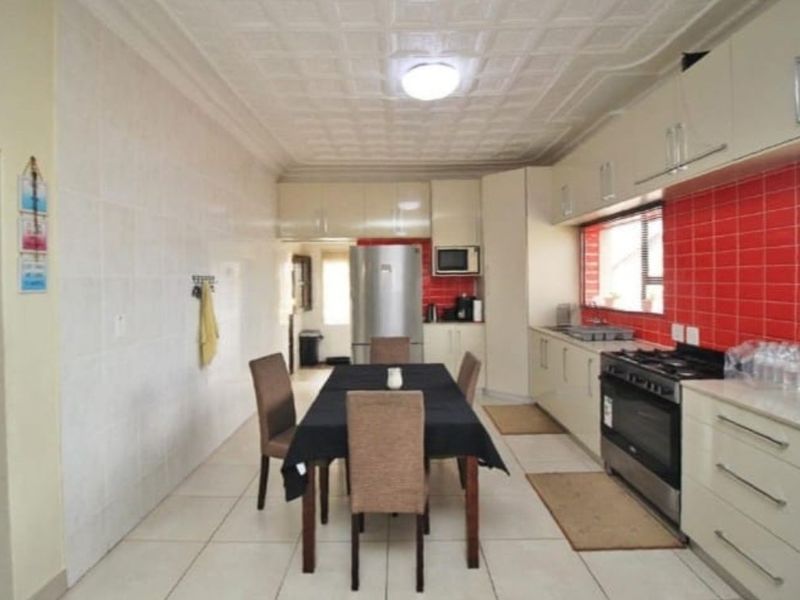 Neat 3-Bedroom Home with New Kitchen and Separate Granny Flat - Photo 3