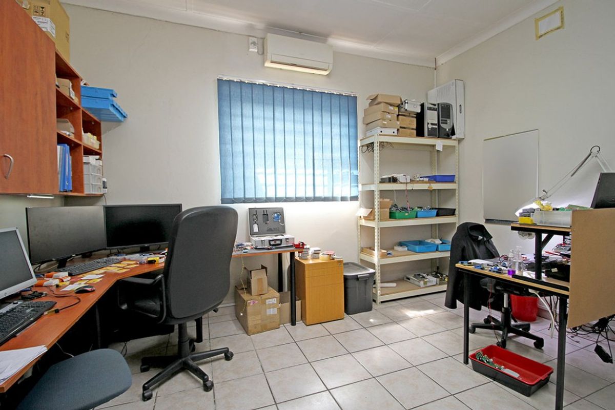Versatile Business Property with Offices, Boardroom, and Top Security - Photo 4