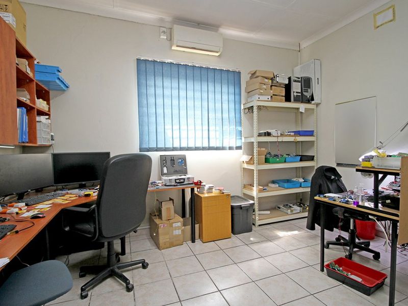 Versatile Business Property with Offices, Boardroom, and Top Security - Photo 4