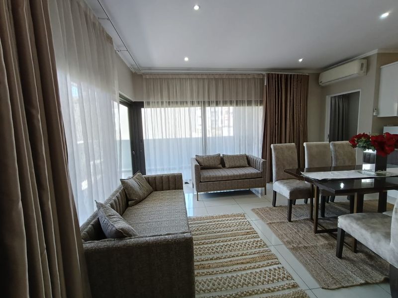 Beautifully furnished 3 bedroom apartment in central Umhlanga Ridge. - Photo 2