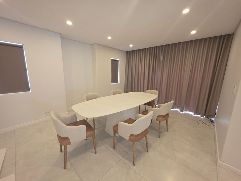 A Sophisticated Entertainer's Dream Home in the Prestigious Sandown Enclave - Photo 5