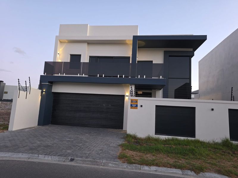 A Sophisticated Entertainer's Dream Home in the Prestigious Sandown Enclave - Photo 1