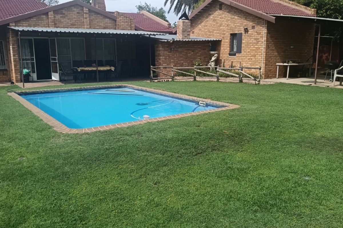 Designed for families who enjoy hosting, this property features ample entertainment space, plenty of parking, and a serene, quiet setting." - Photo 5