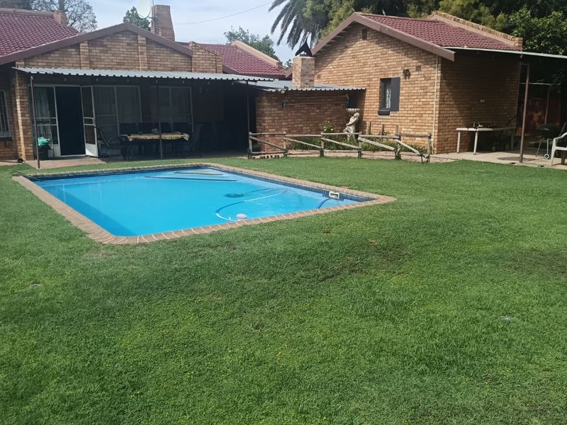 Designed for families who enjoy hosting, this property features ample entertainment space, plenty of parking, and a serene, quiet setting." - Photo 5