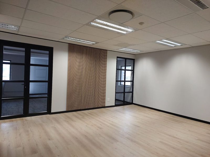 A GRADE FITTED OFFICE SUITE IN RIVONIA WITH FIXED UTILITIES - Photo 2
