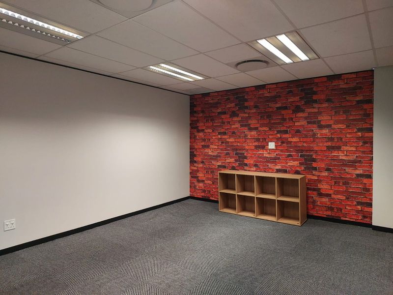 A GRADE FITTED OFFICE SUITE IN RIVONIA WITH FIXED UTILITIES - Photo 10
