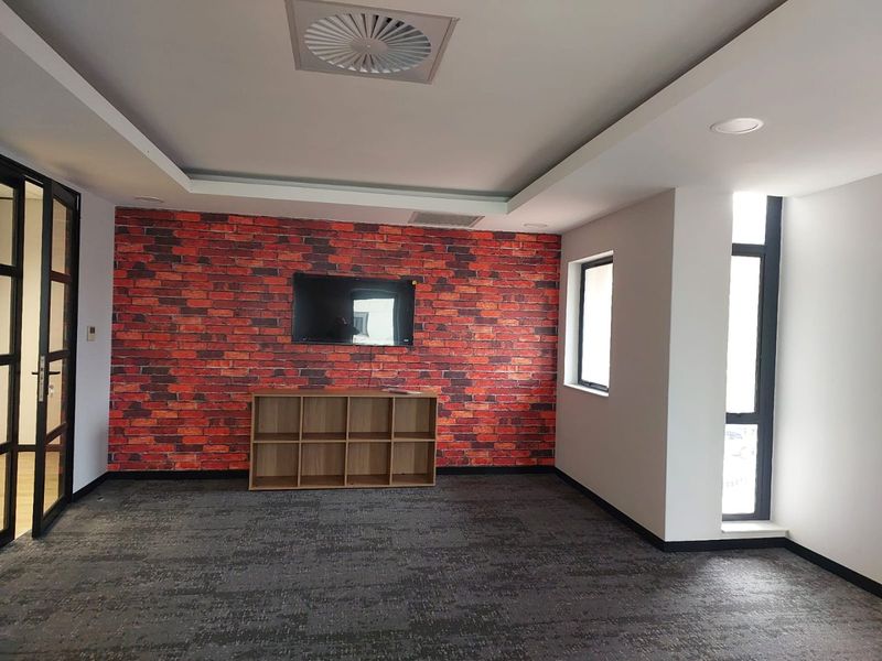 A GRADE FITTED OFFICE SUITE IN RIVONIA WITH FIXED UTILITIES - Photo 3