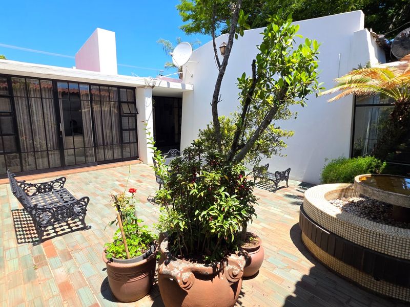 Stylish Family Home with Modern Interiors and Generous Yard - Photo 2