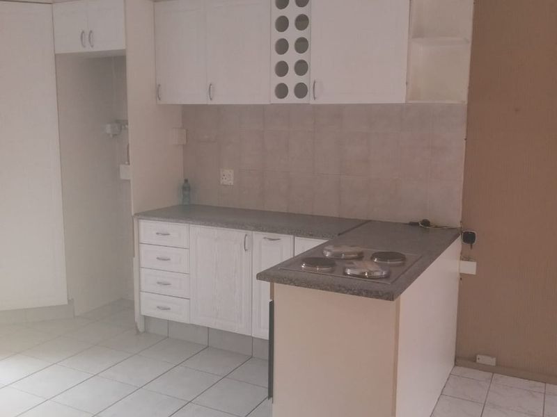 Beautiful Two-Bedroom Home with Pool and Modern Living - Photo 10