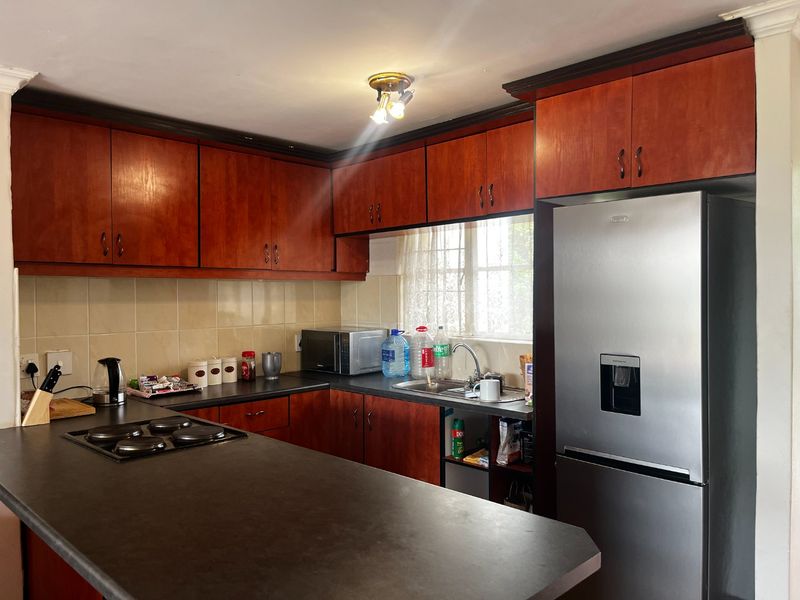 Cozy 2-Bedroom Apartment with Dam Views  Caribbean Golf Estate - Photo 3