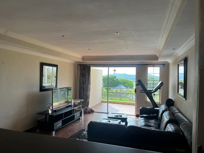 Cozy 2-Bedroom Apartment with Dam Views  Caribbean Golf Estate - Photo 9