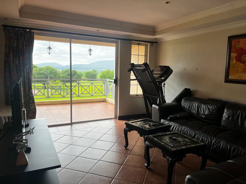 Cozy 2-Bedroom Apartment with Dam Views  Caribbean Golf Estate - Photo 6