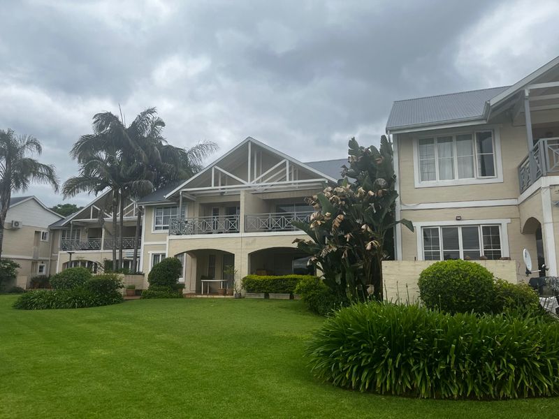 Cozy 2-Bedroom Apartment with Dam Views  Caribbean Golf Estate - Photo 1