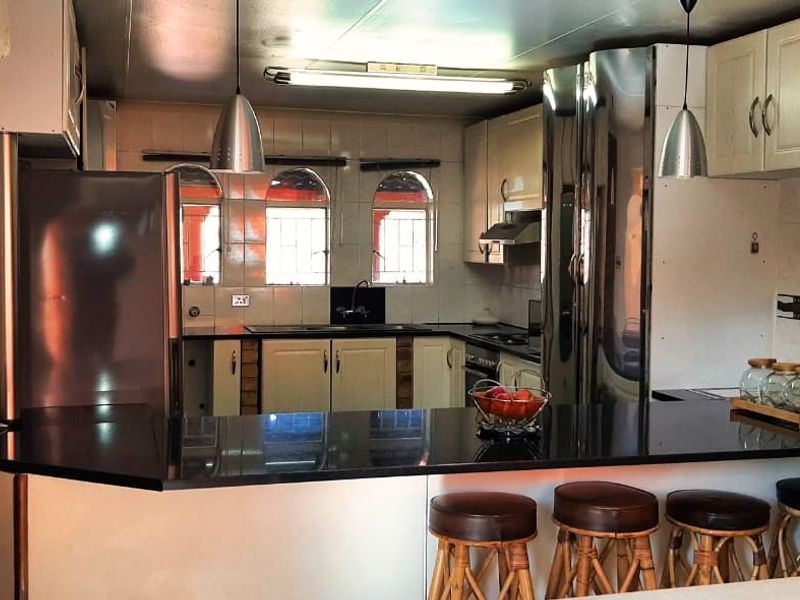 Executive Double-Story Dream: 3/4 Bed Home + Flatlet, Pool, and 5 Baths in Gated Leachville Ext 1 - Photo 6