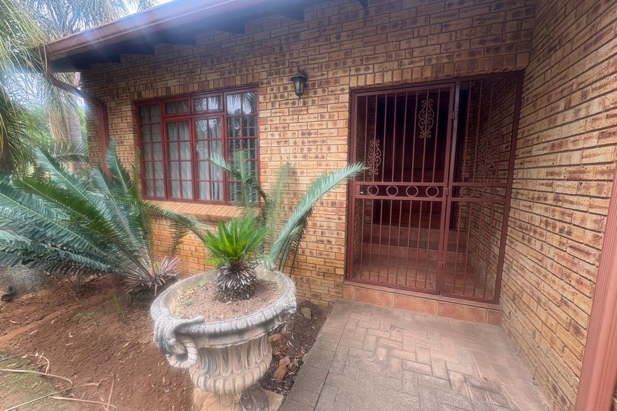 A Well Established 3 Bed 2 Bath Low-Maintenance Face-Brick Home For Sale in Helderkruin - Photo 4