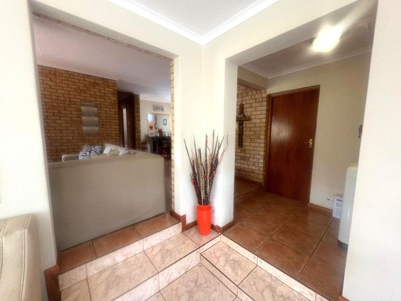 A Well Established 3 Bed 2 Bath Low-Maintenance Face-Brick Home For Sale in Helderkruin - Photo 6