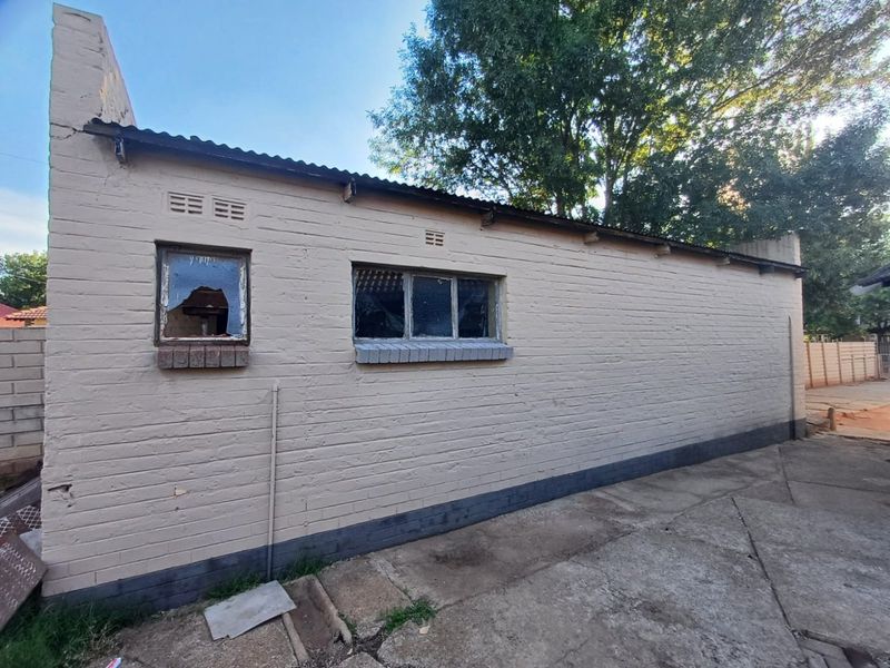 A Charming Family Home with Great Potential in Stilfontein Ext 4 - Photo 4