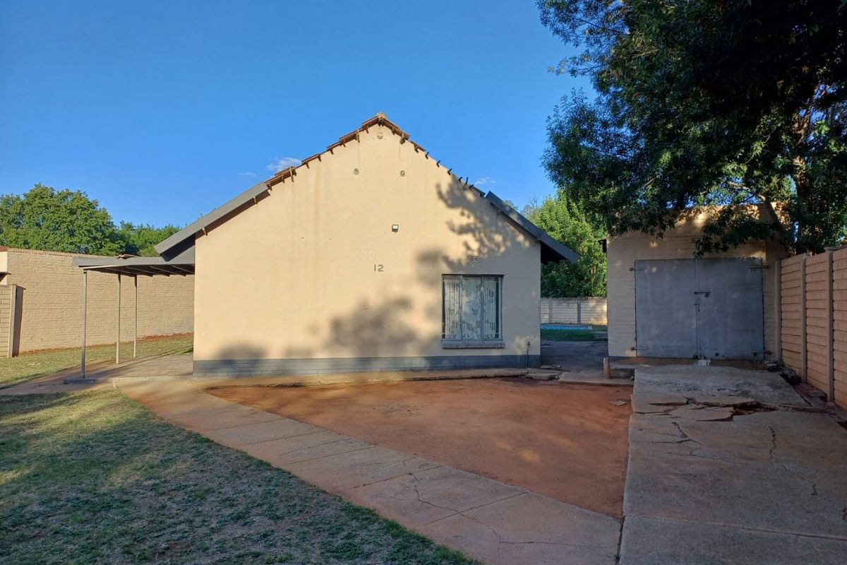 A Charming Family Home with Great Potential in Stilfontein Ext 4 - Photo 3