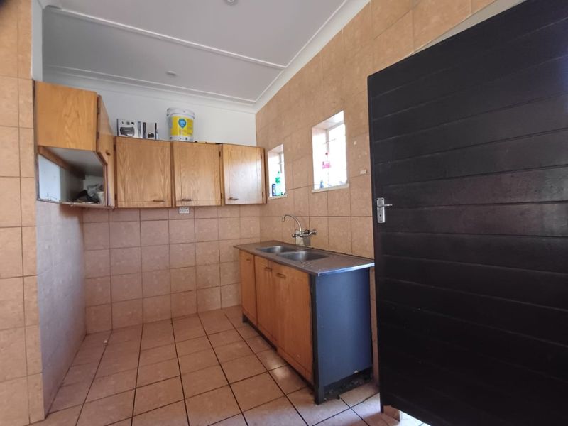 A Charming Family Home with Great Potential in Stilfontein Ext 4 - Photo 6