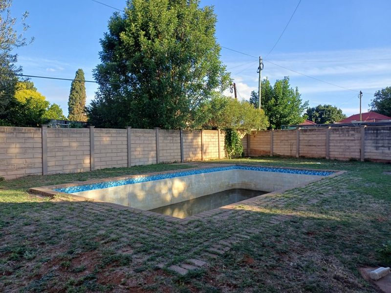 A Charming Family Home with Great Potential in Stilfontein Ext 4 - Photo 5