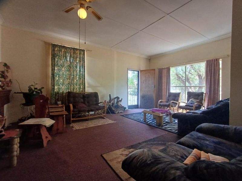 A Spacious and Welcoming Family Home in Stilfontein Ext 1 - Photo 9