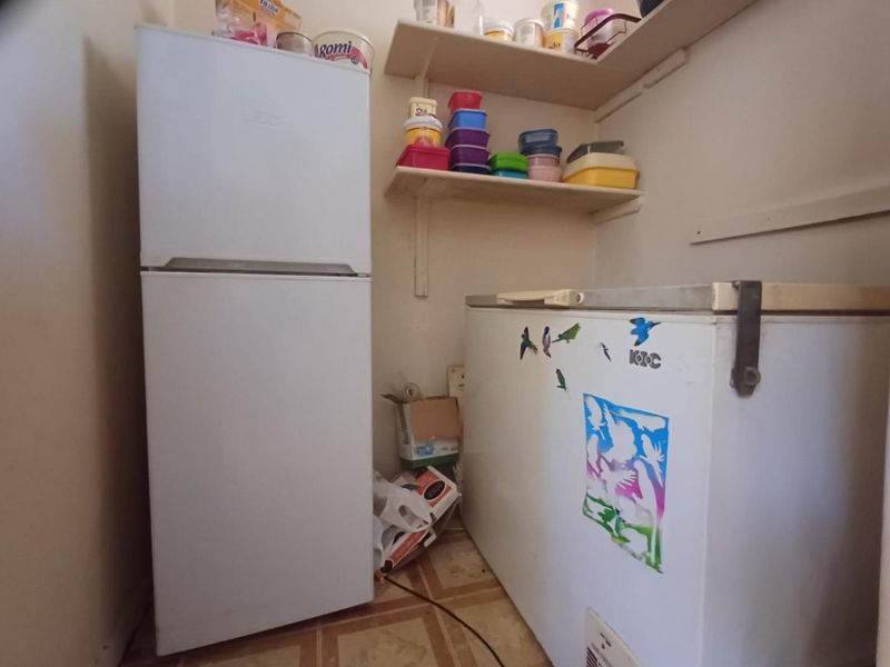 A Spacious and Welcoming Family Home in Stilfontein Ext 1 - Photo 8