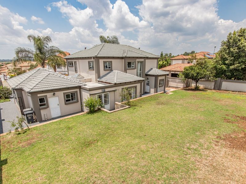 Elegant 5 Bedroom Family Home in a Sought-After Secure Estate in Ruimsig  - Photo 4