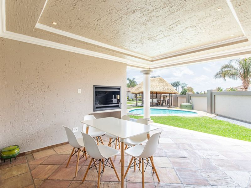 Elegant 5 Bedroom Family Home in a Sought-After Secure Estate in Ruimsig  - Photo 6