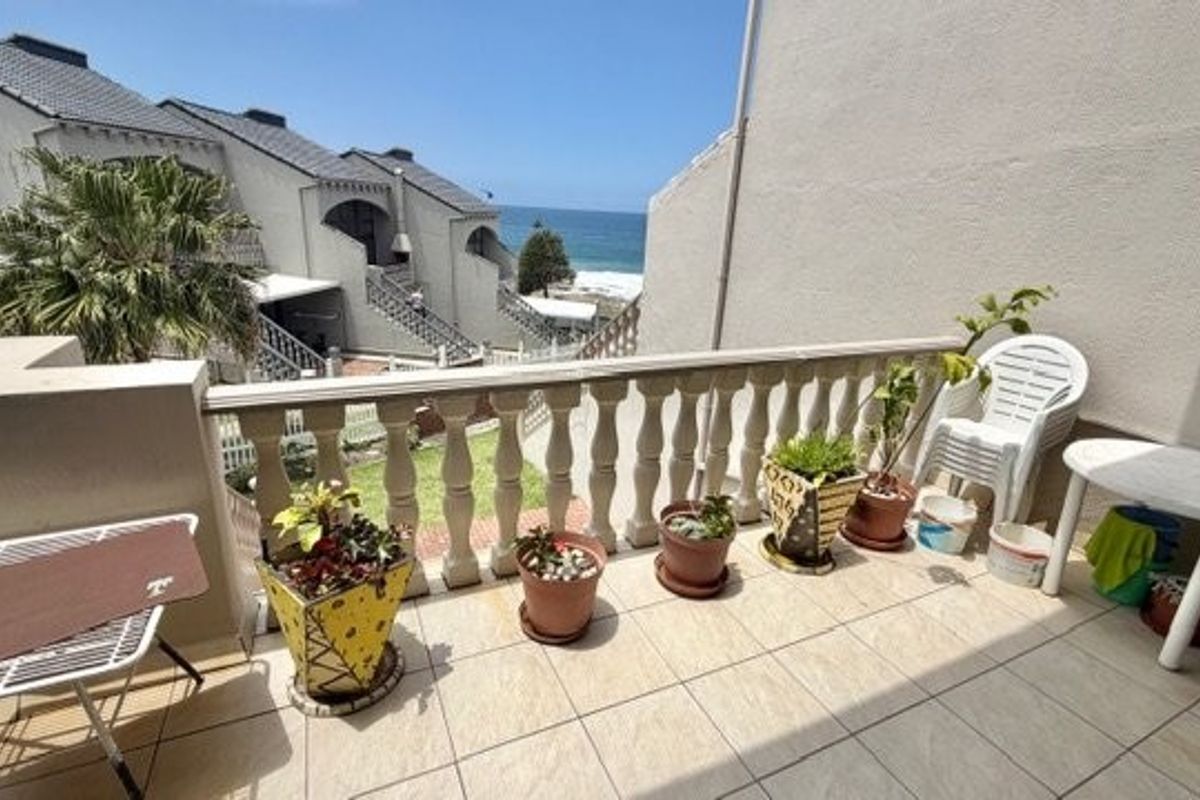 A Coastal Masterpiece — Stylish Beachfront Duplex with Panoramic Ocean Views - Photo 3