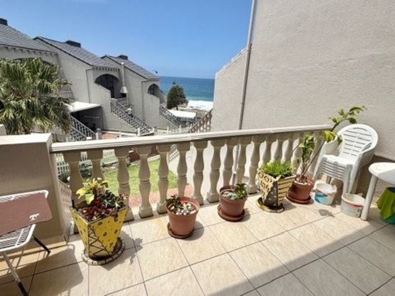 A Coastal Masterpiece — Stylish Beachfront Duplex with Panoramic Ocean Views - Photo 3