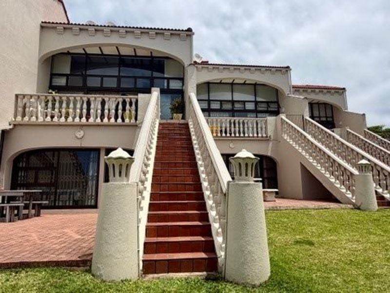 A Coastal Masterpiece — Stylish Beachfront Duplex with Panoramic Ocean Views - Photo 2
